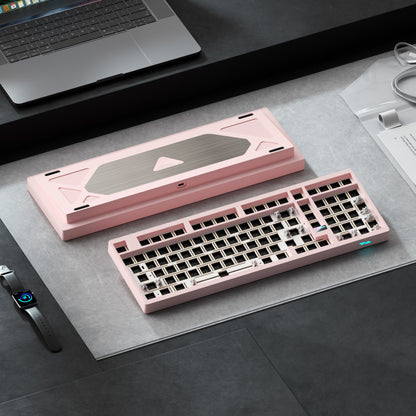 Weikav Max 102 Pink mechanical keyboard on a desk with a laptop and smartwatch in the background