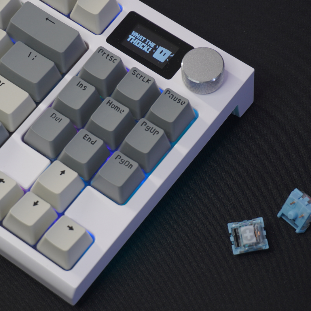 Detail photo of the Attack Shark - K86 Premium TKL Wireless Mechanical Keyboard, showing off the Blue Whale Linear Switches, Media Knob, RGB and Customizable screen