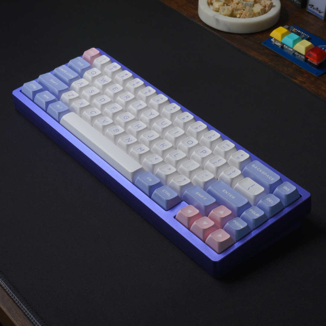 A Photo of the What The Thock Lucky65 65% mechanical keyboard in the Lavender color, taken from above showing the full keyboard