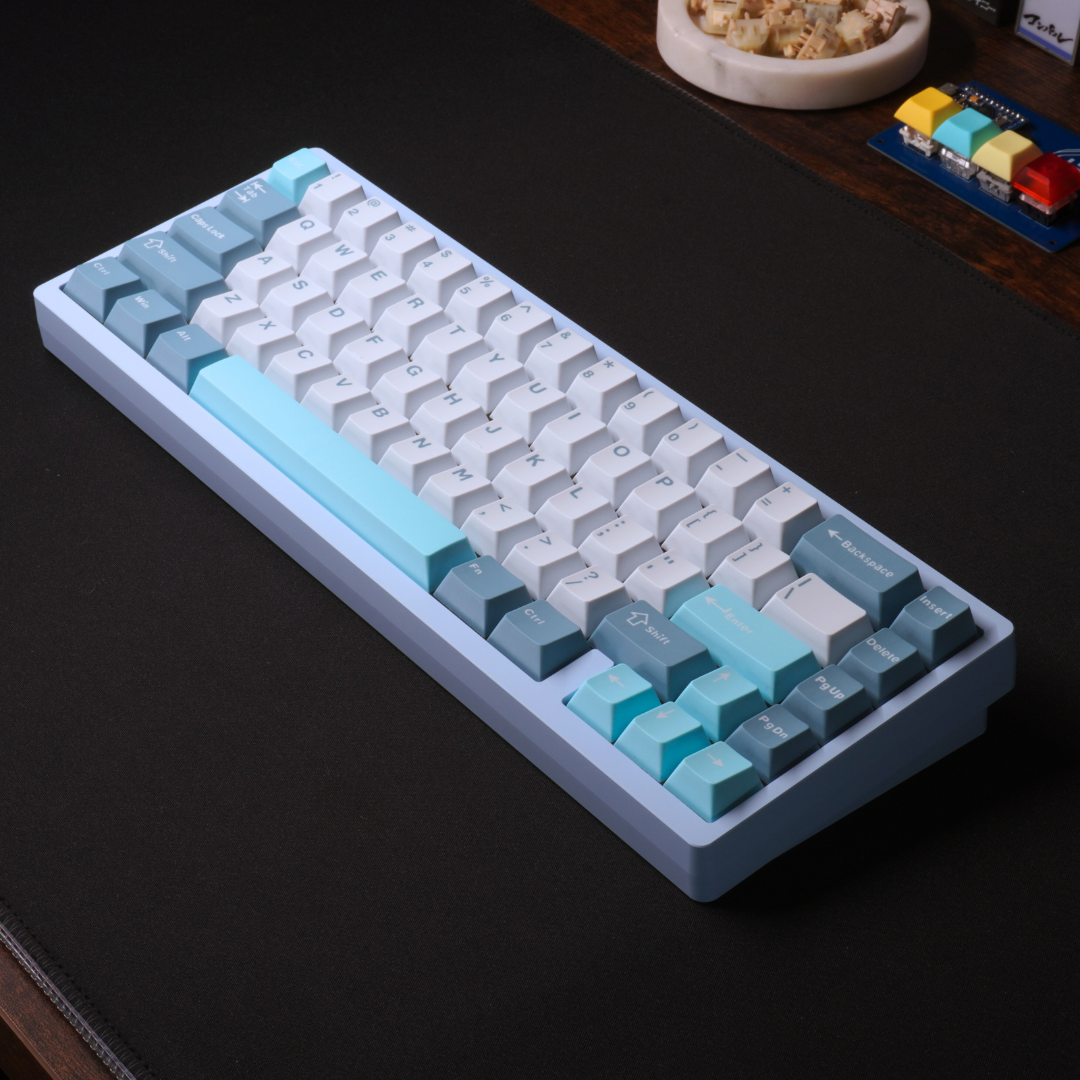 A Photo of the What The Thock Lucky65 65% mechanical keyboard in the Ocean Blue color, taken from above showing the full keyboard