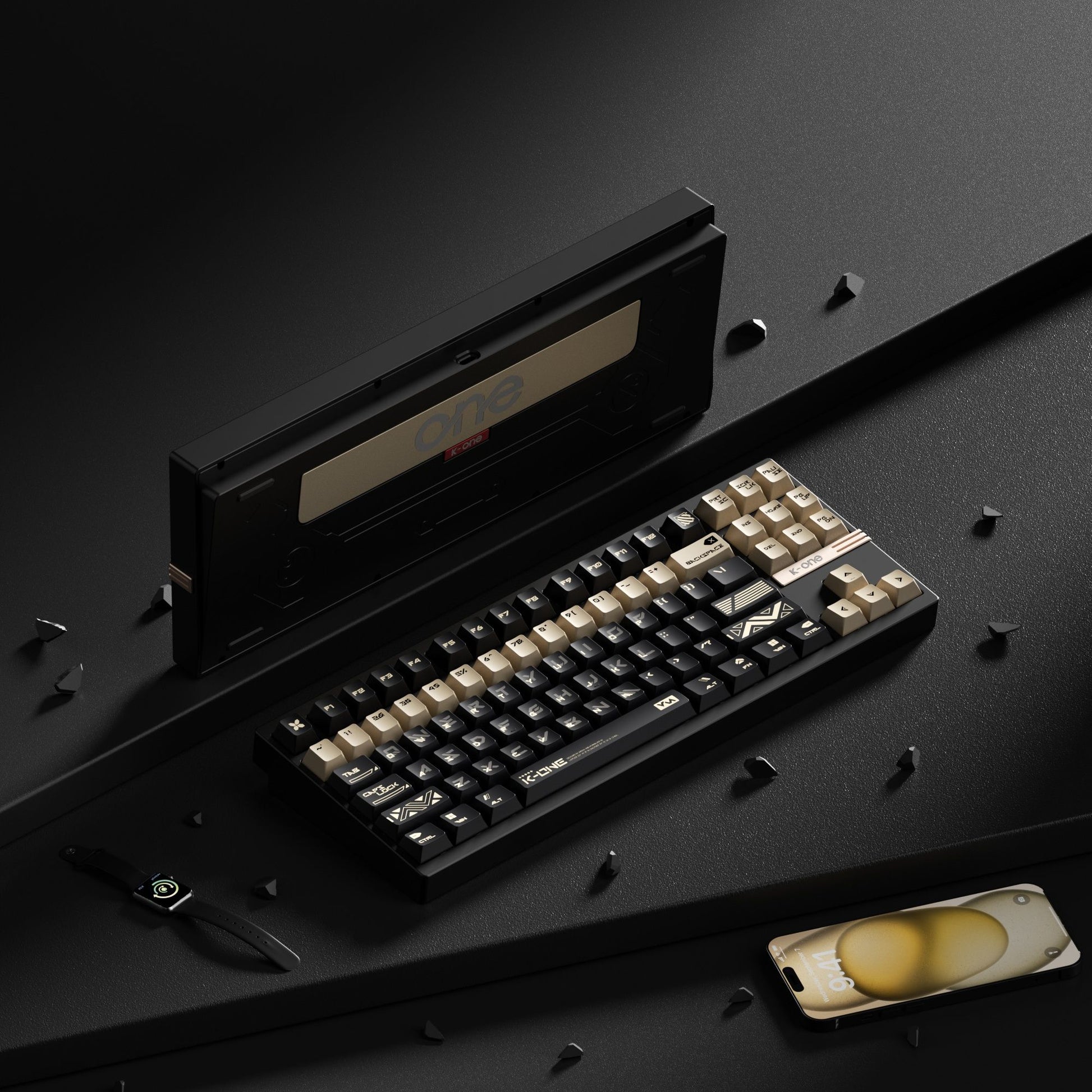 Mechanical keyboard with a black and gold design on a dark surface