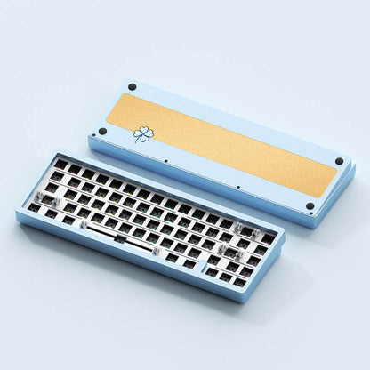 A Photo of the What The Thock Lucky65 65% mechanical keyboard showing the front and back of the blue version in barebones form